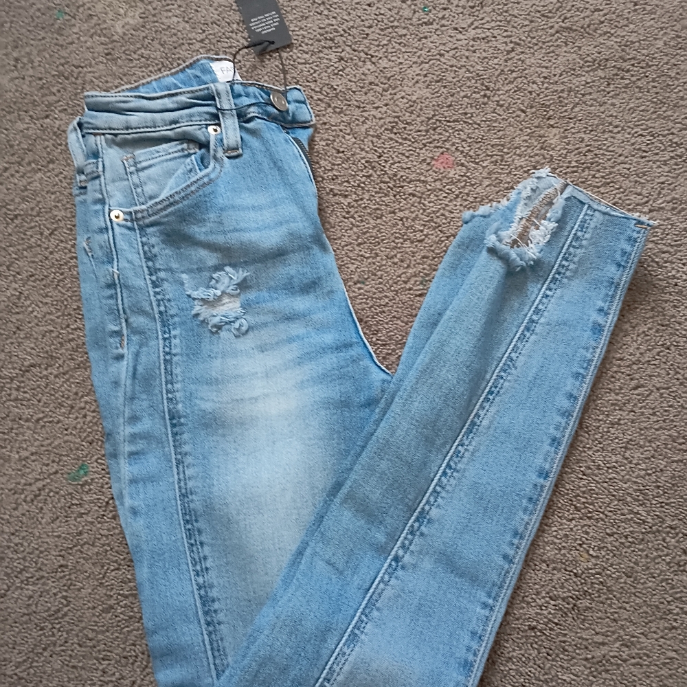 Fashion Nova Light Blue Ripped Skinny Jeans